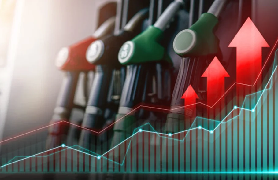 Fuel pump nozzles with a rising price chart overlay